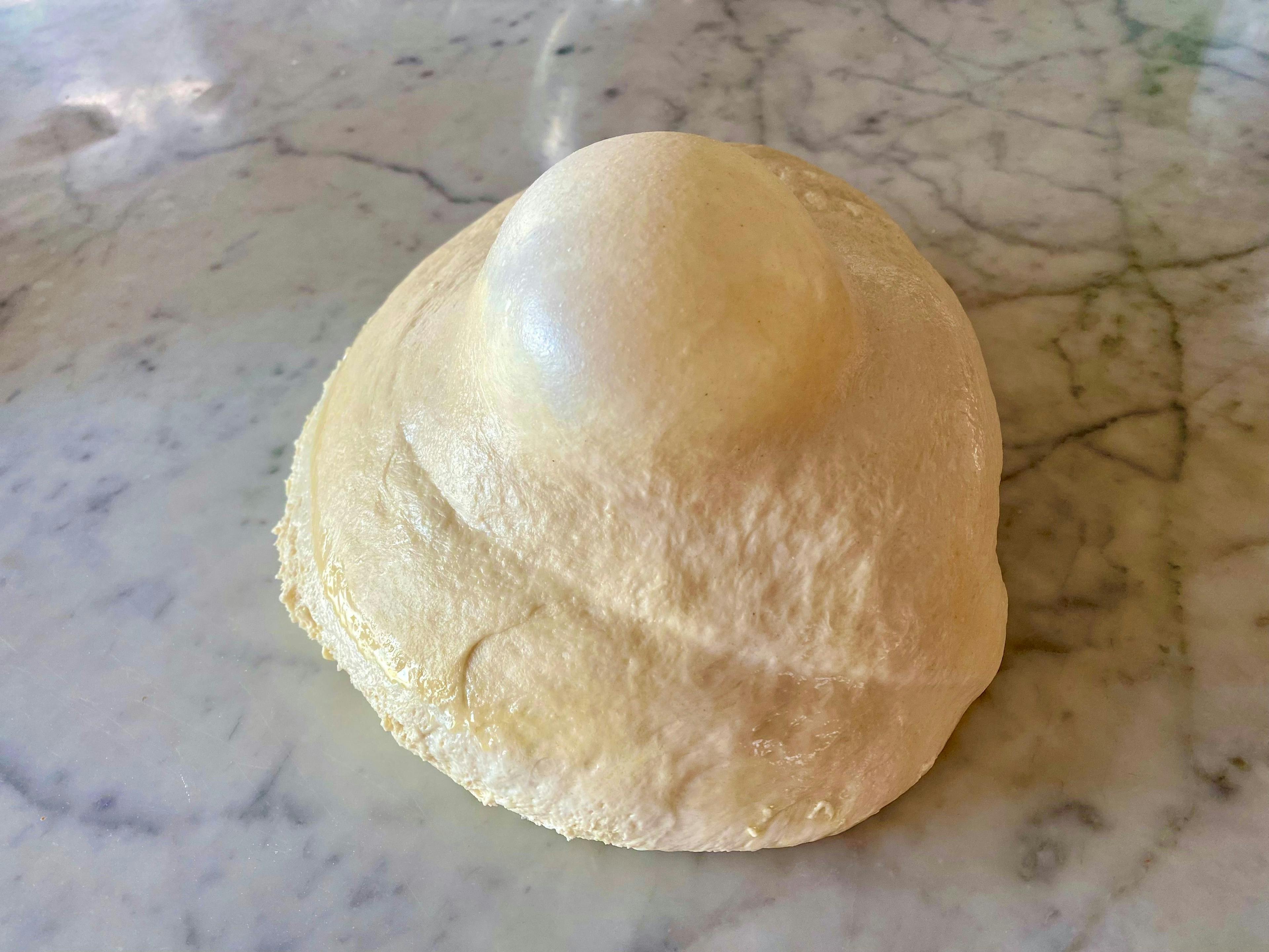 pizza dough with a large air bubble