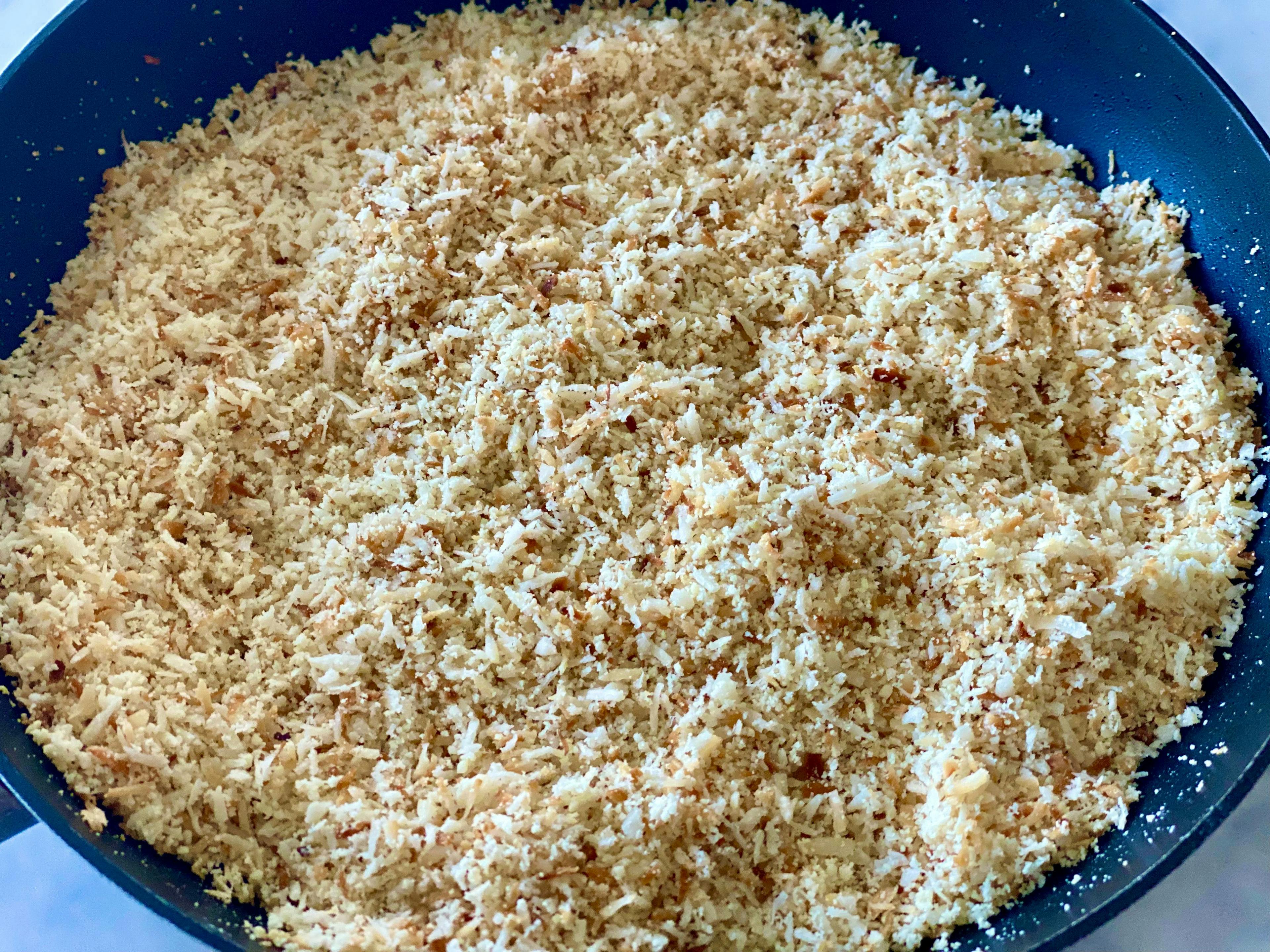 toasted coconut and almonds in a pan