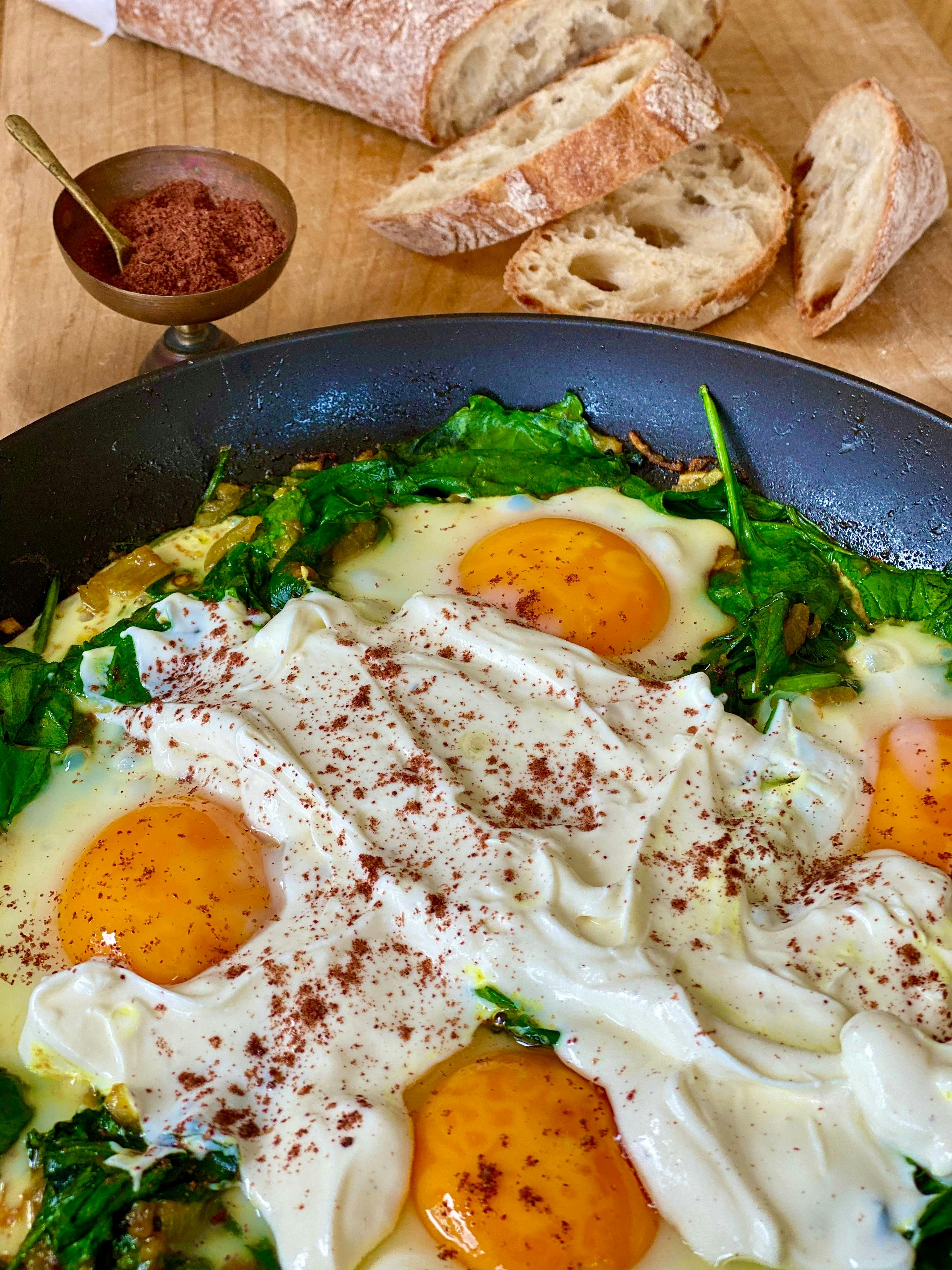 fried eggs with the strained yogurt and sumac