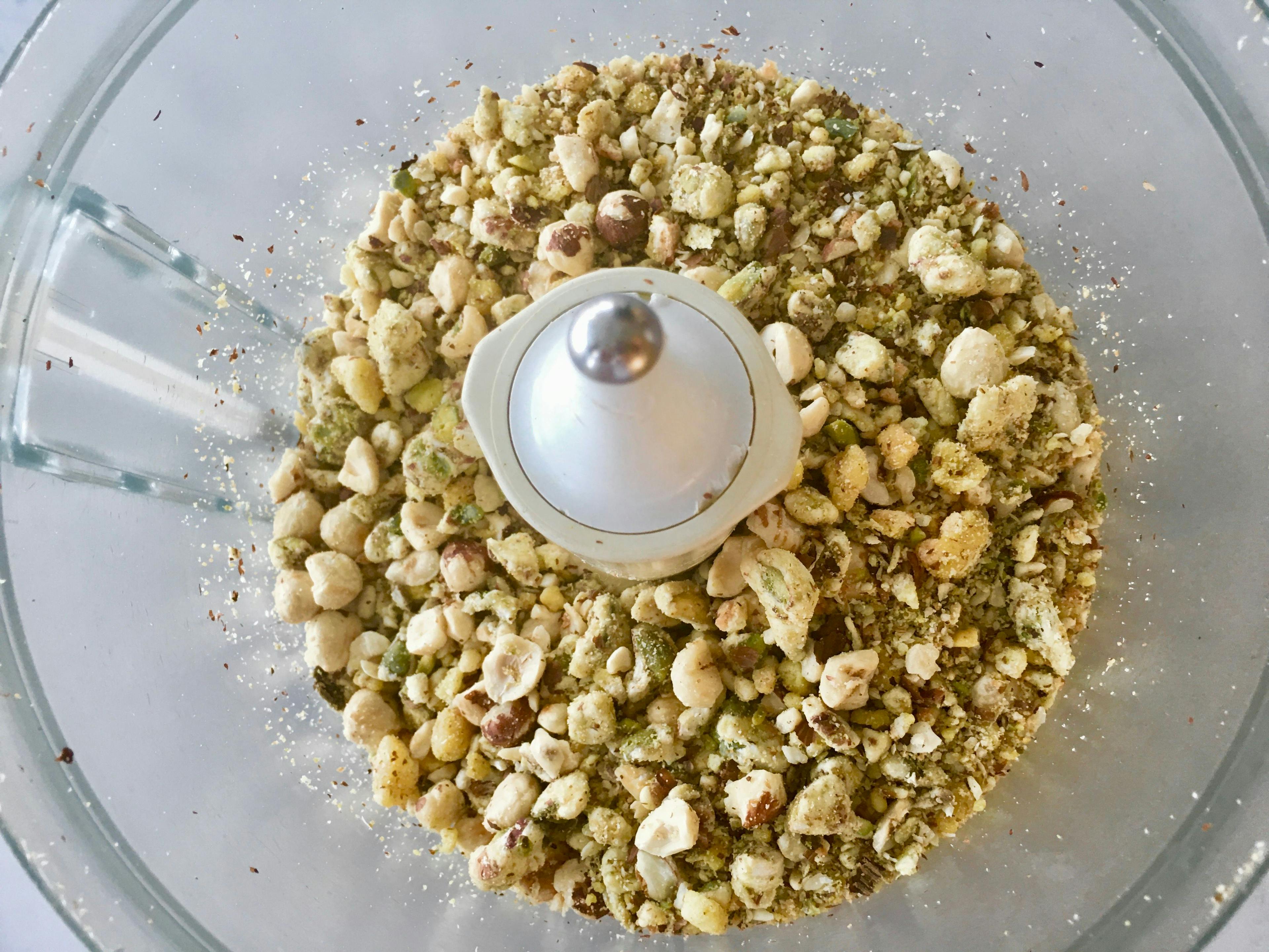 chopped hazelnuts and nougat in magi-mix